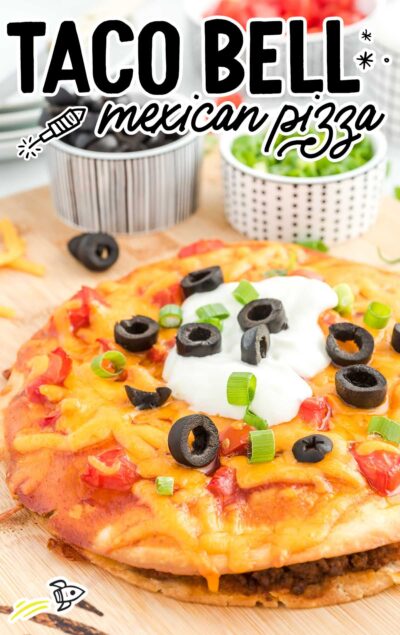 close up shot of Taco Bell Mexican Pizza on a wooden board