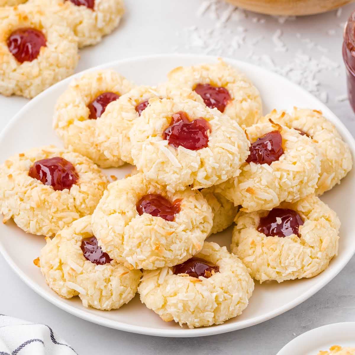 close up shot of a bunch of overhead Jeweled Coconut Drops on a plate