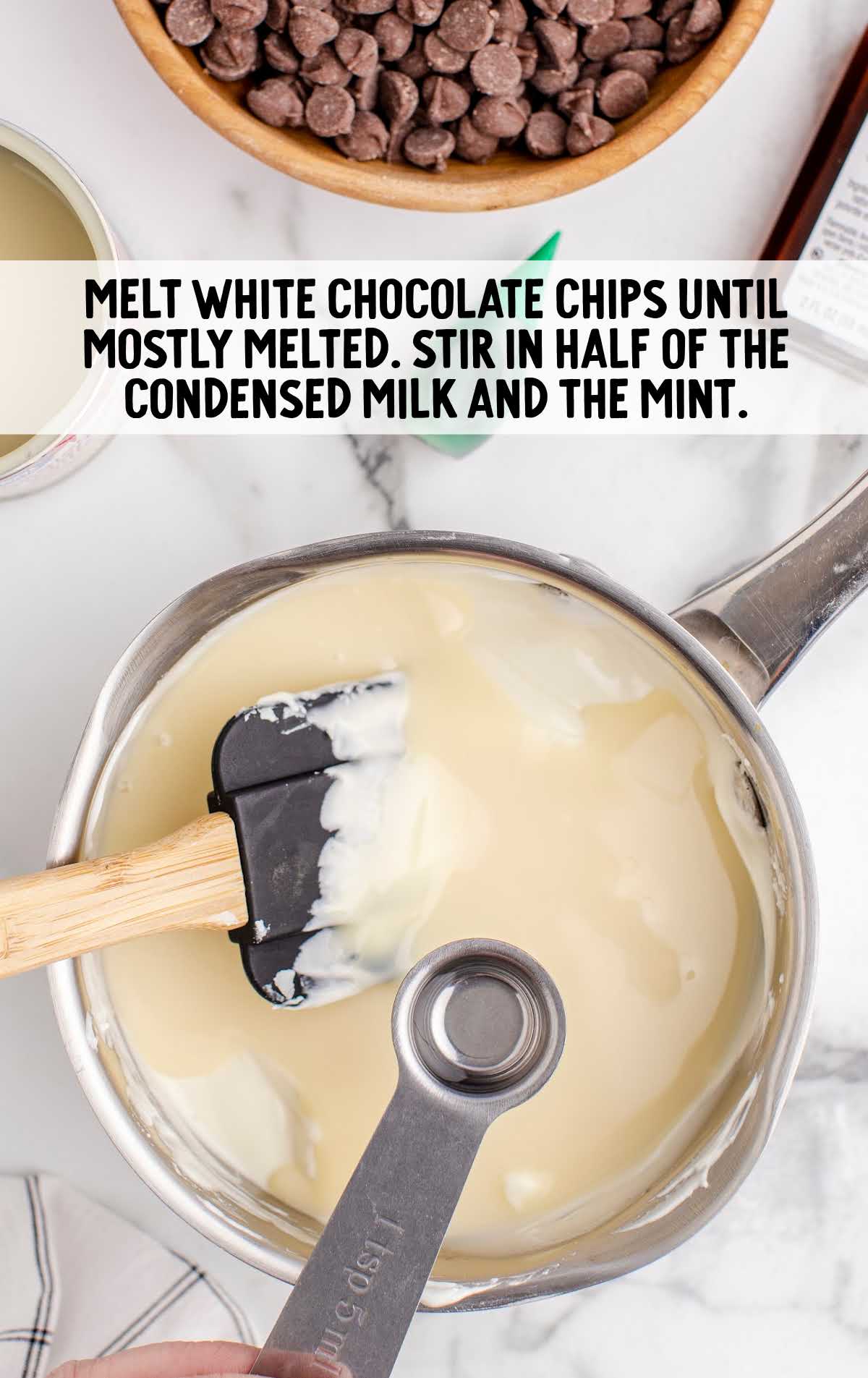 white chocolate, condensed milk and mint stirred in a pot