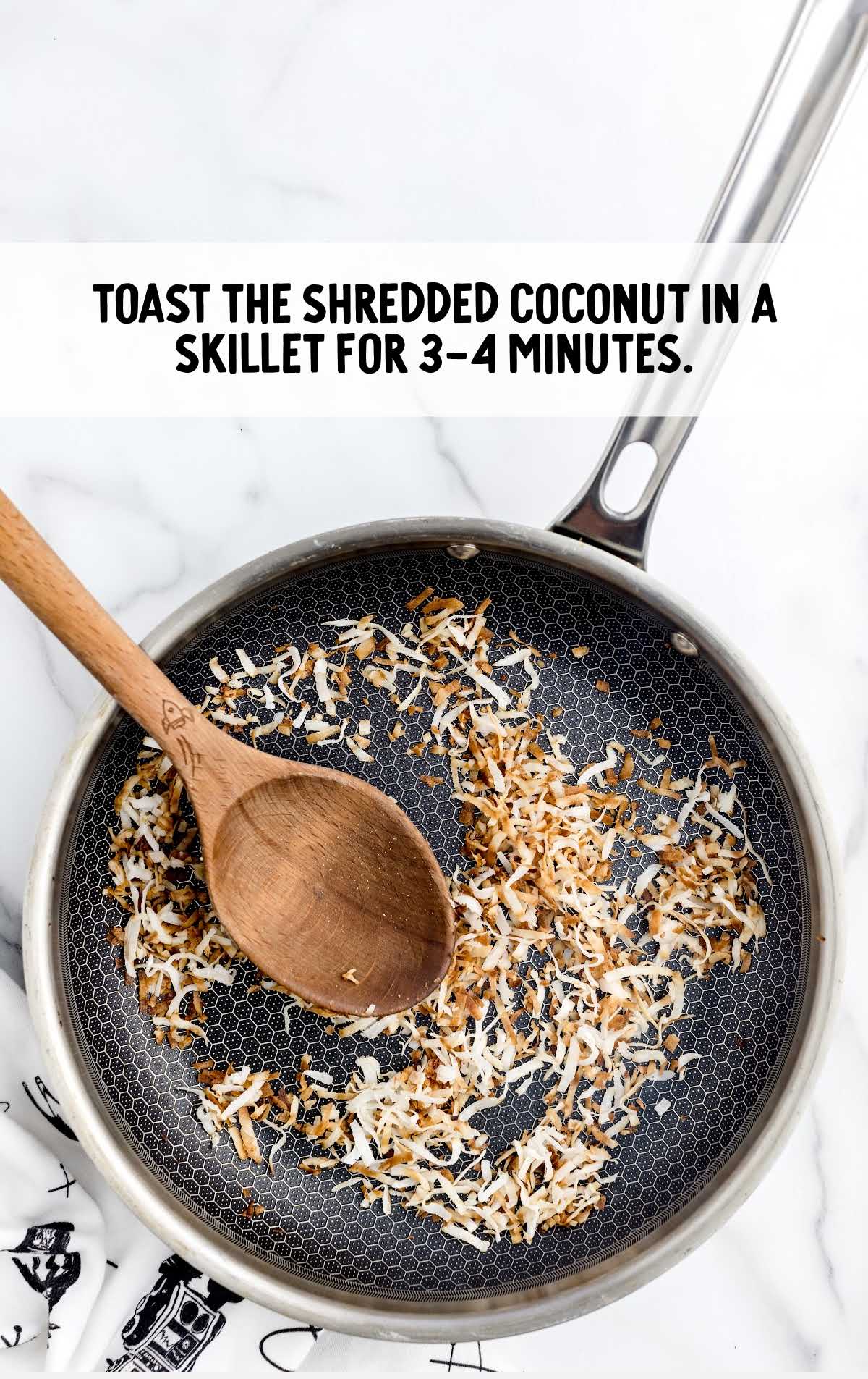 shredded coconut placed on a skillet