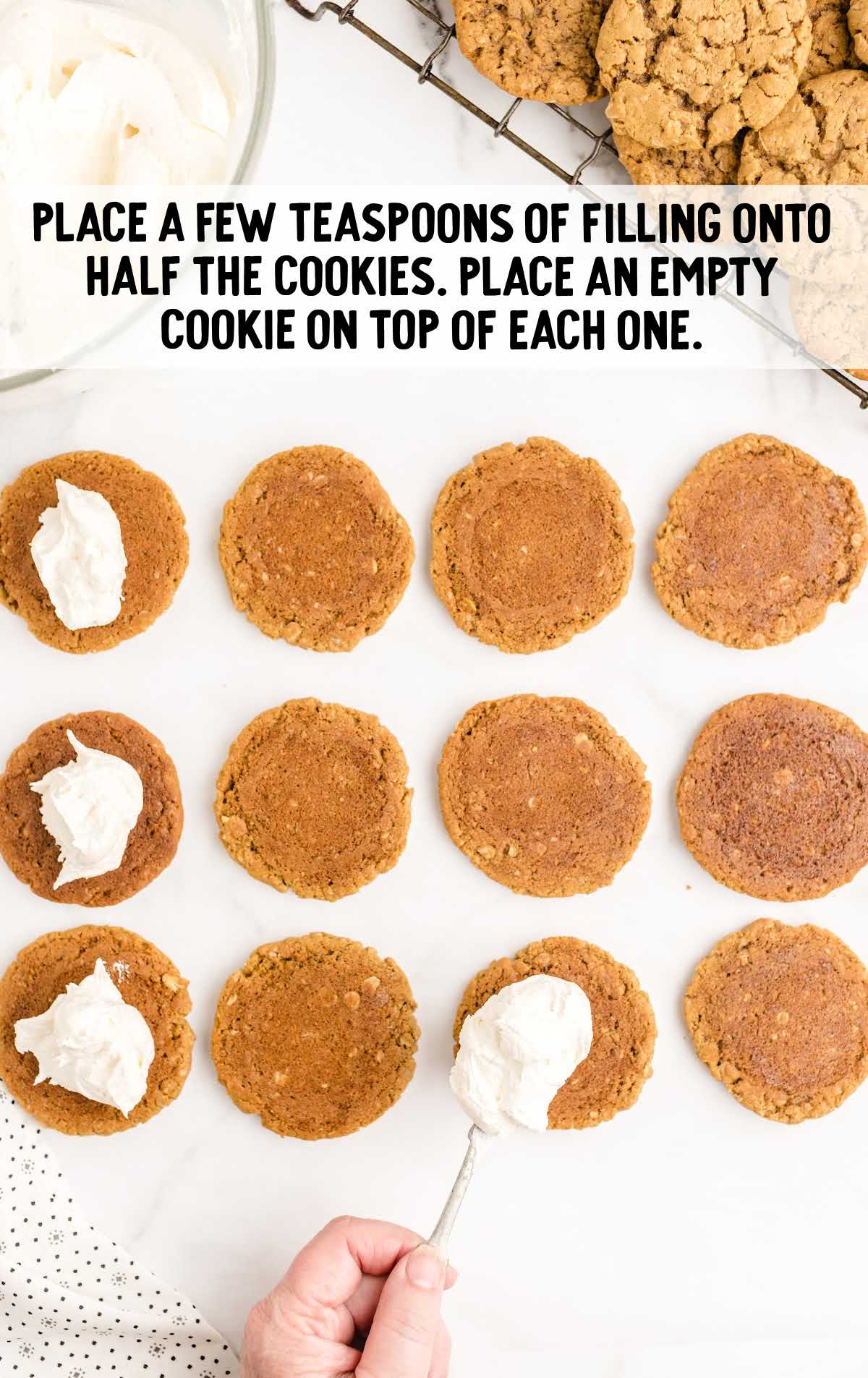 teaspoons of fillings placed into half of the cookies