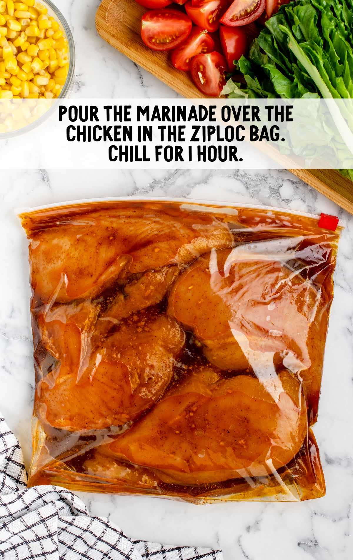 chicken placed in a zip loc bag with the marinade