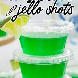 a close up shot of Tequila Jello Shots stacked on top of each other on a stand