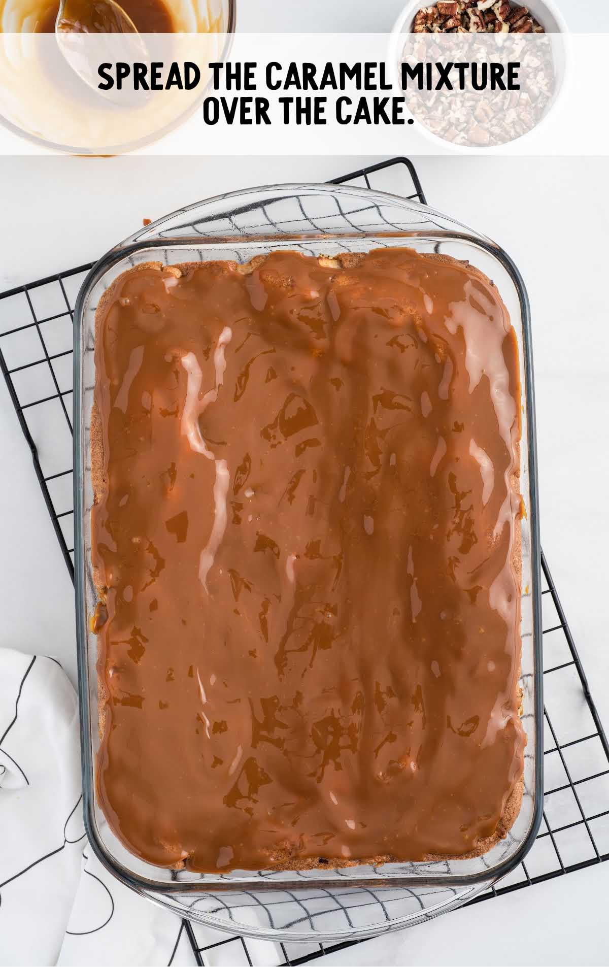caramel mixture spread over the cake in a a baking dish