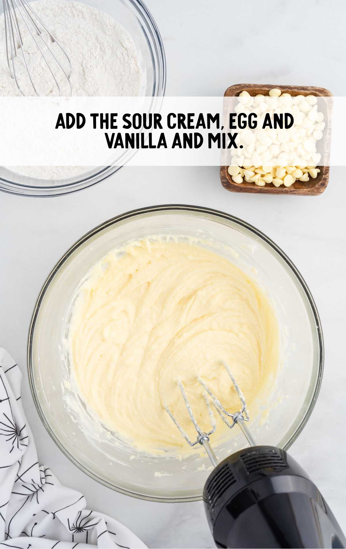 sour cream, egg and vanilla mixed with the butter mixture and blended together in a bowl