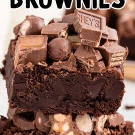 close up shot of Candy Bar Brownies stacked on top of each other