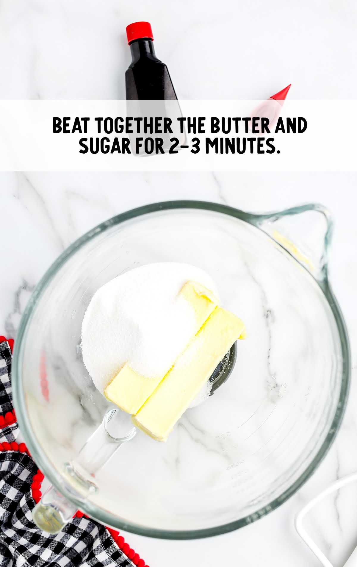 butter and sugar combined in a measuring cup