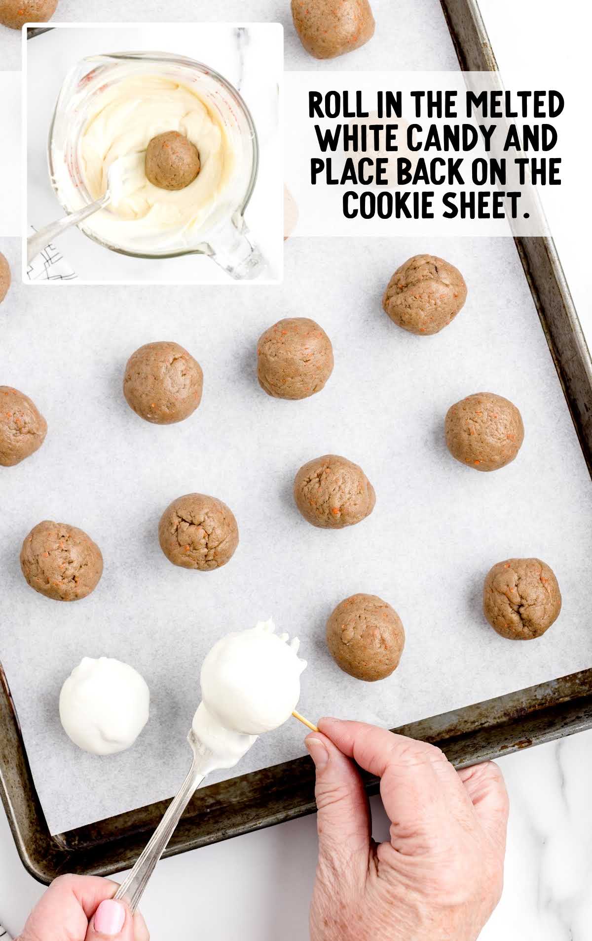 bites rolled in the melted white candy on a cookie sheet