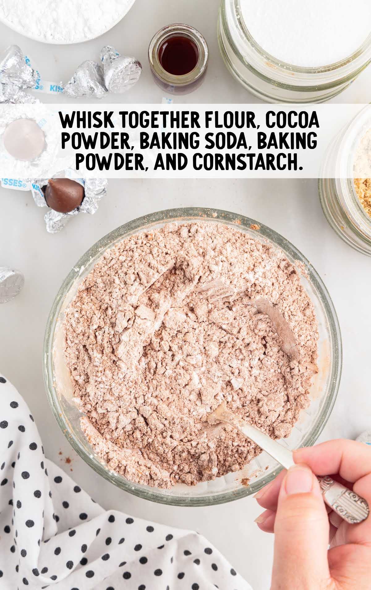 flour, cocoa powder, baking soda, baking powder and cornstarch whisked in a bowl