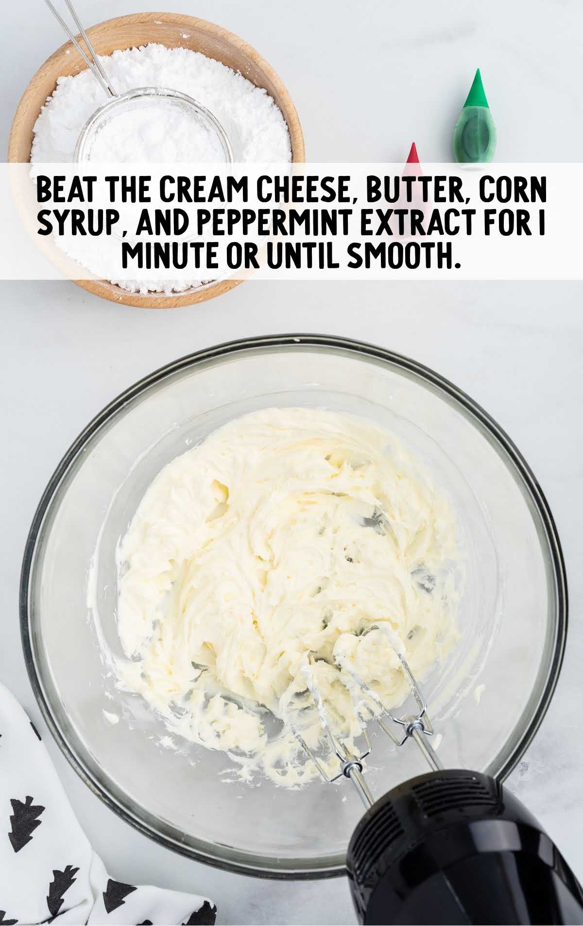 cream cheese, butter, corn syrup, and peppermint extract blended in a bowl