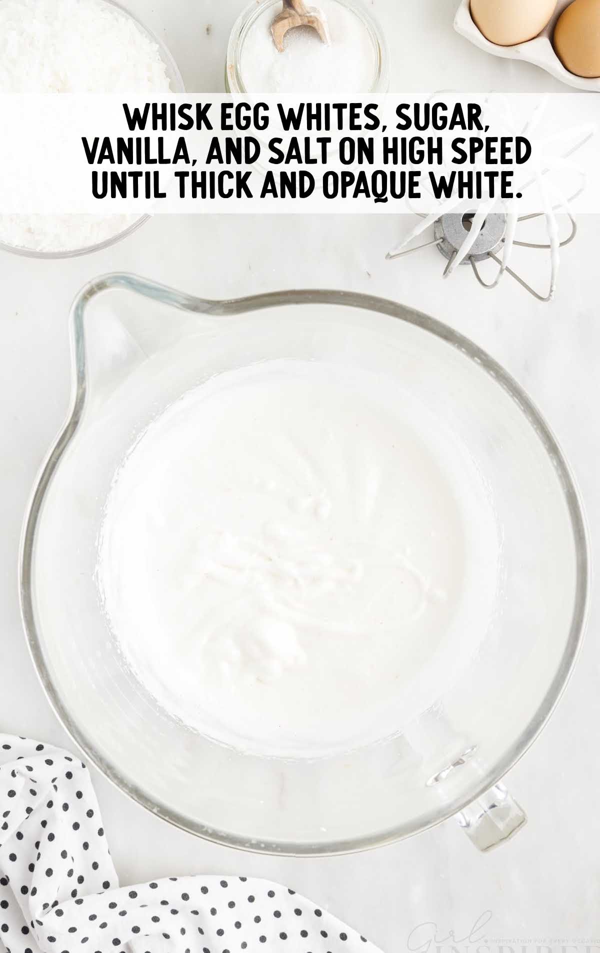 egg whites, sugar, vanilla, and salt whisked in a bowl