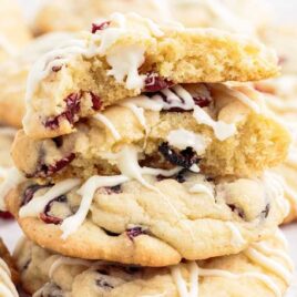 close up shot of Cranberry White Chocolate Cookies stacked on top of each other