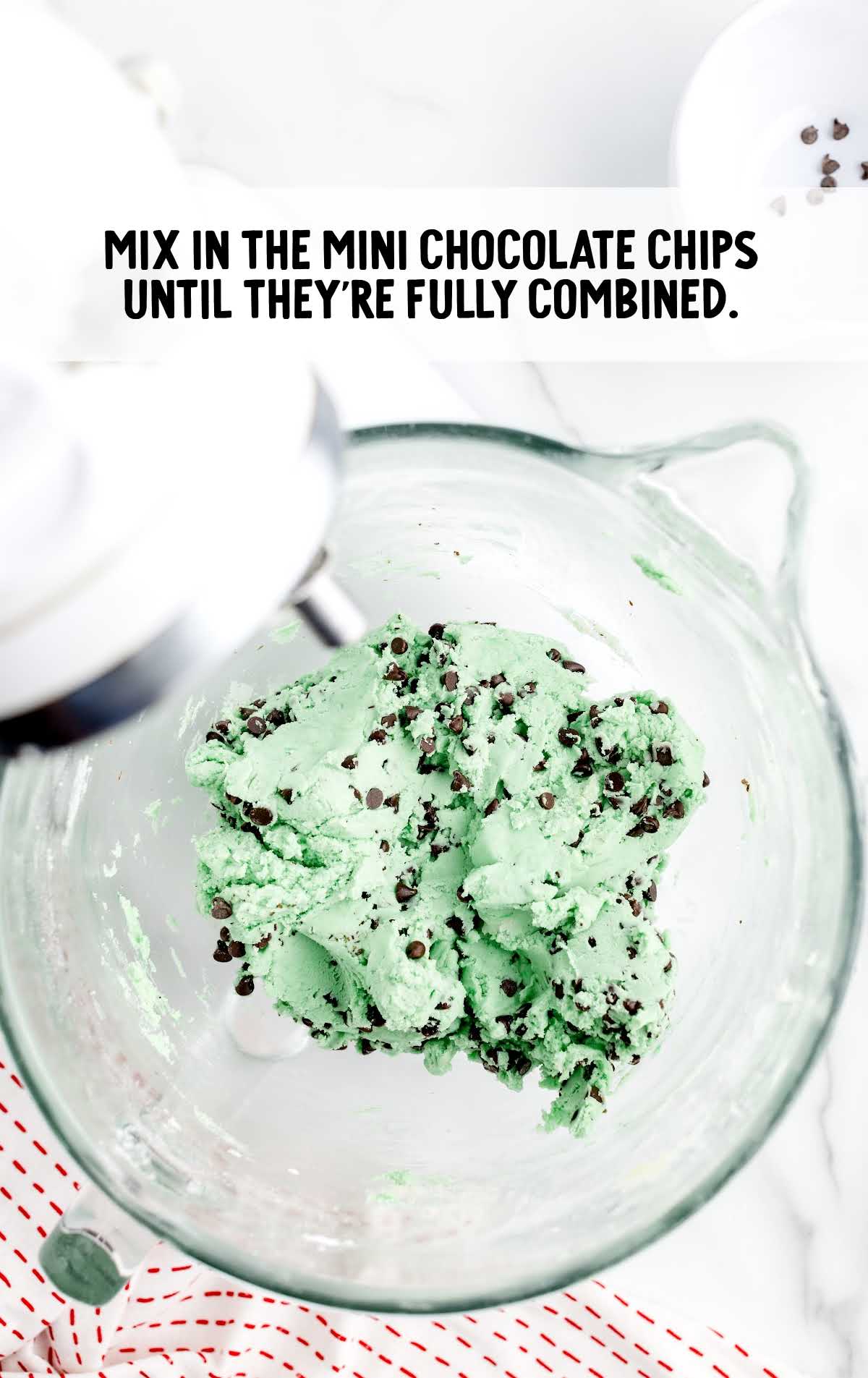 mini chocolate chips blended into the food coloring mixture in a measuring cup