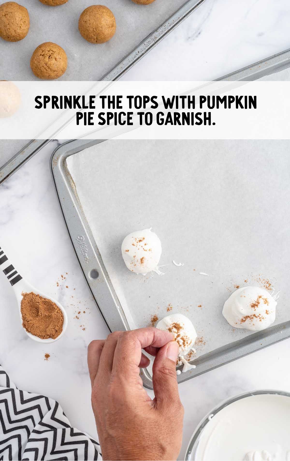 pumpkin pie spice sprinkled on top of the bites in a baking dish