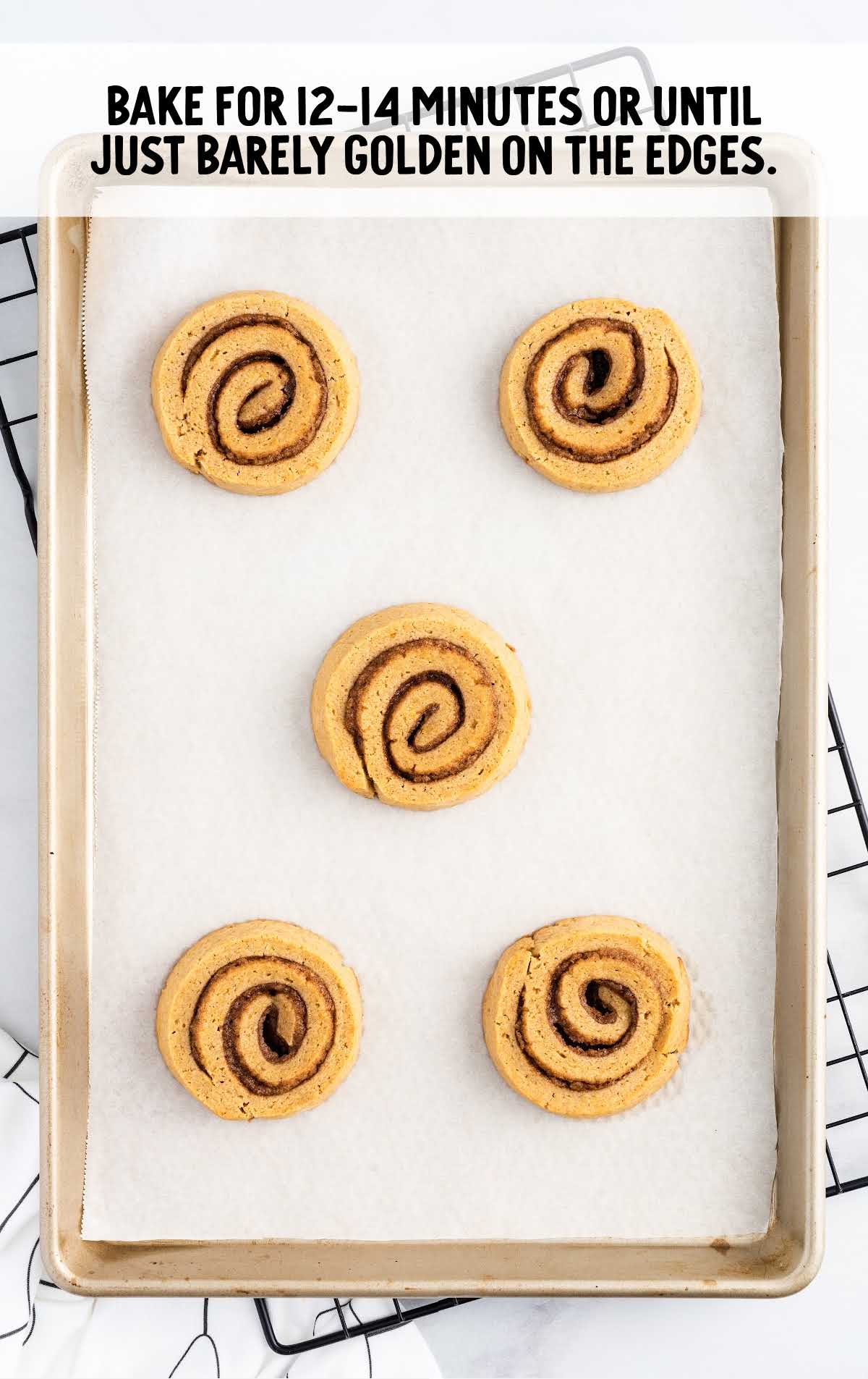 Pumpkin Spice Roll Cookies baked in a parchment sheet