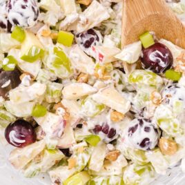 close up shot of Waldorf Salad with a spoon grabbing a piece