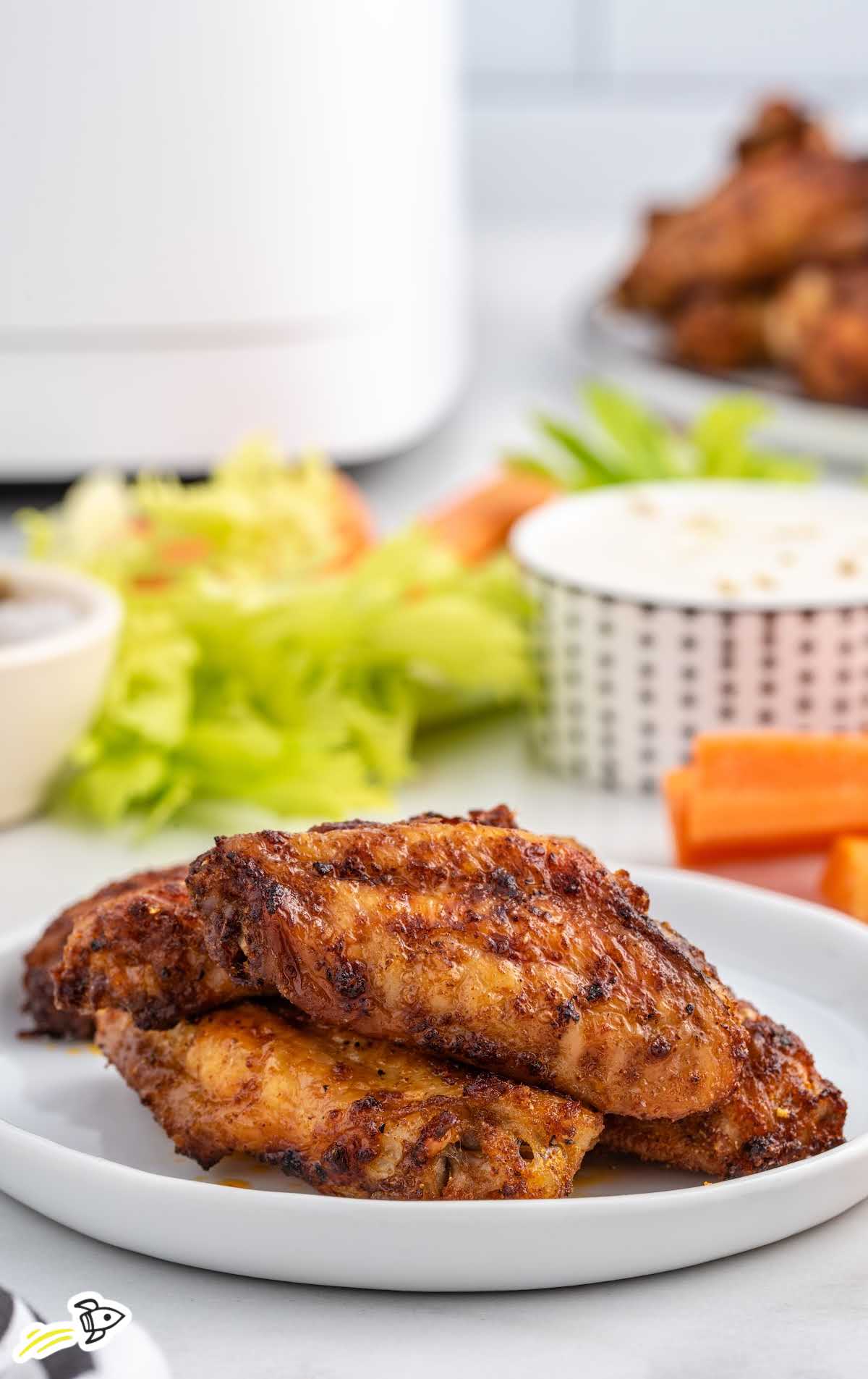 close up shot of Air Fryer Chicken Wings on a plate