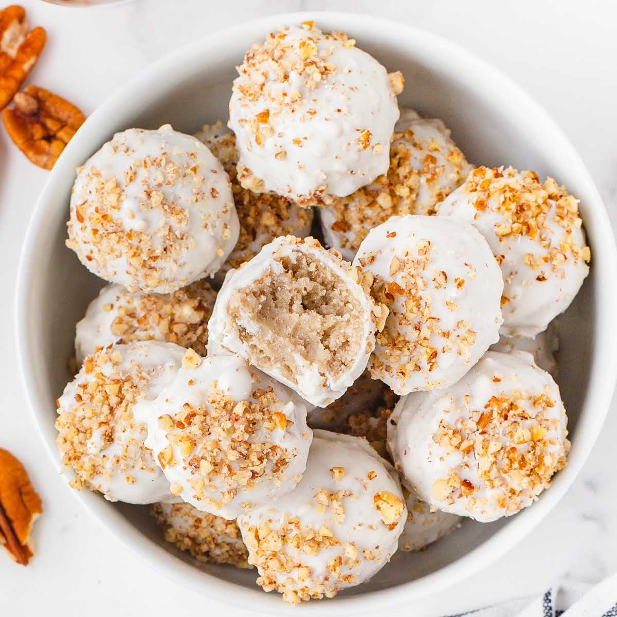 overhead shot of Butter Pecan Cheesecake Bites in a bowl