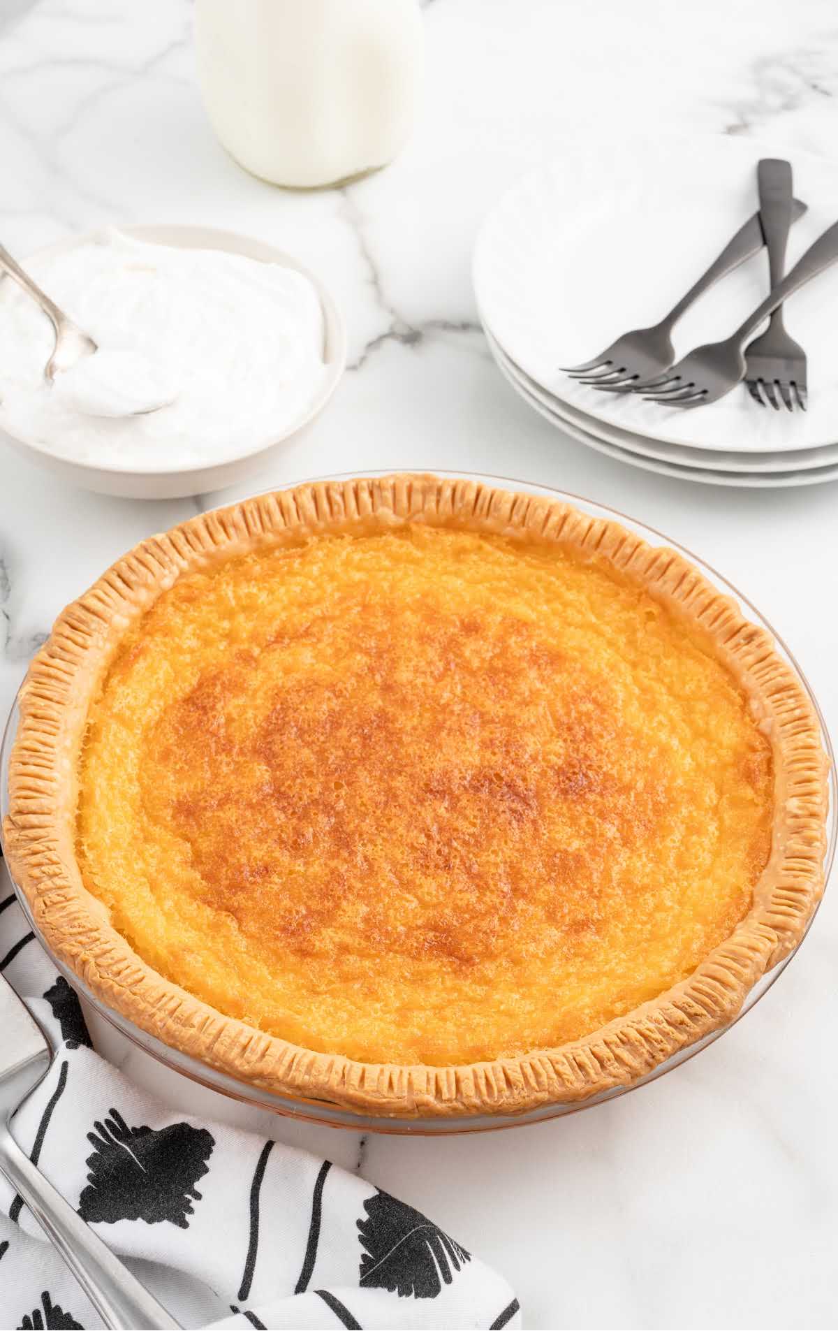 a overhead shot of buttermilk pie on a plate