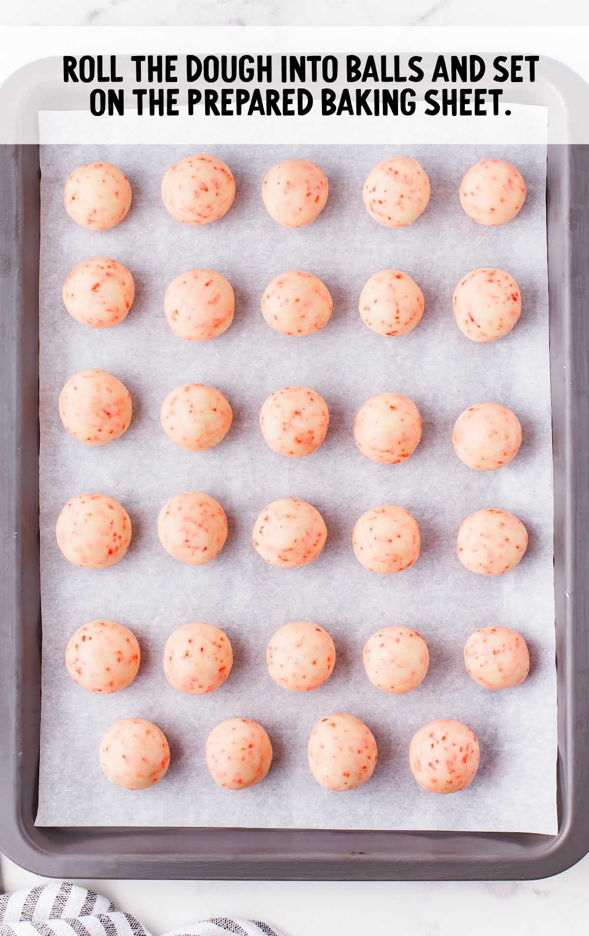 roll dough into balls and place on baking sheet