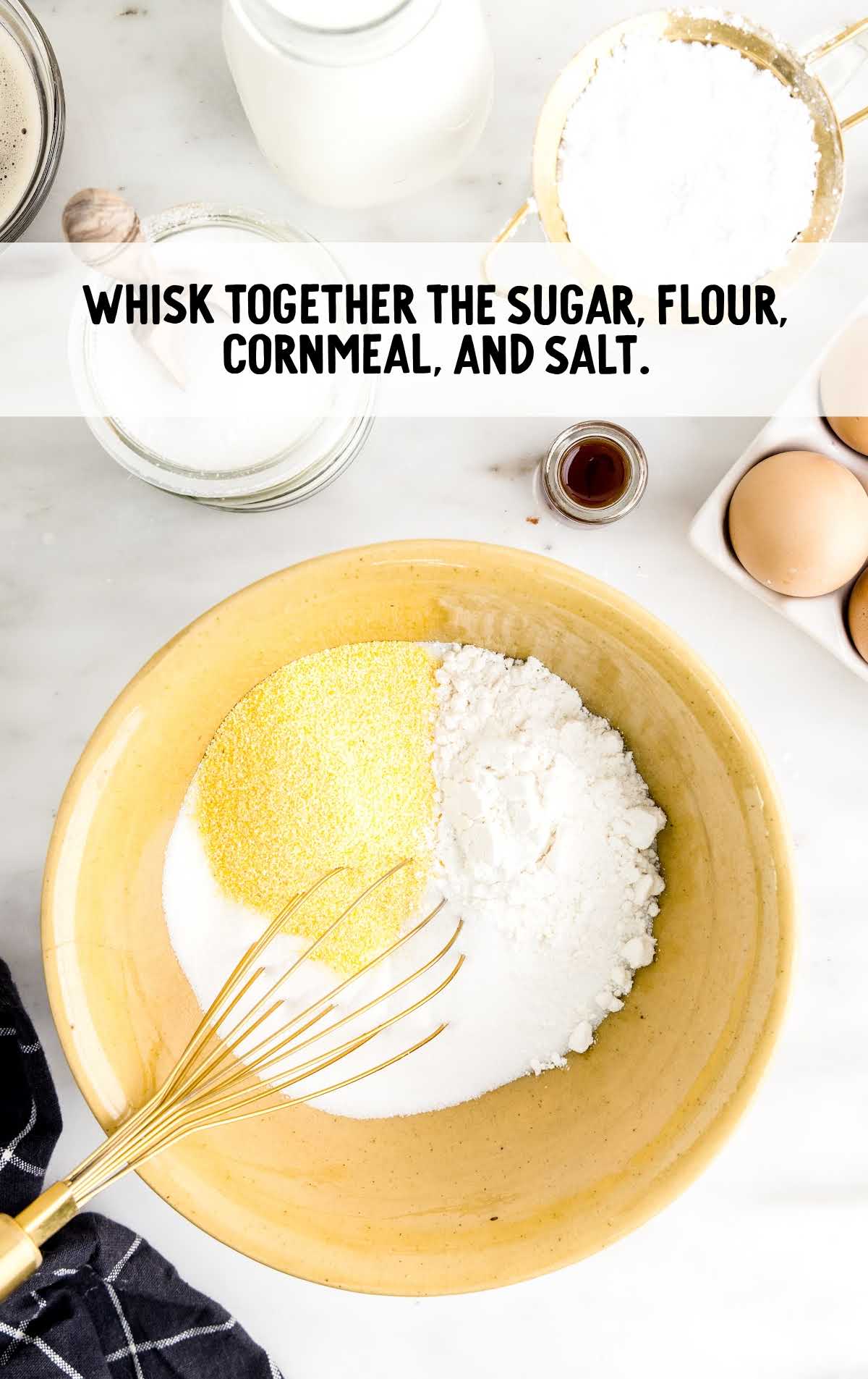 sugar, flour, cornmeal, and salt whisked in a bowl