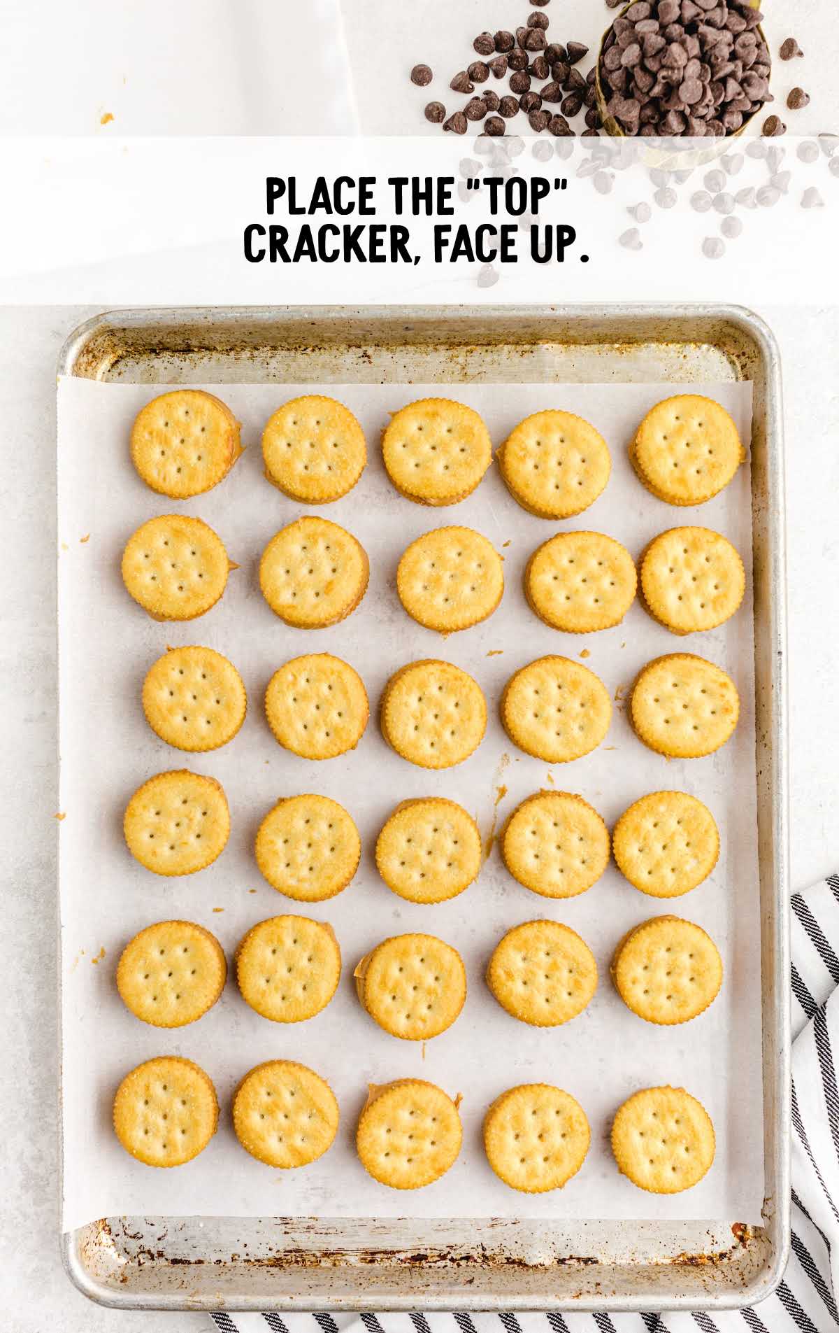 top cracker faced up on a baking sheet