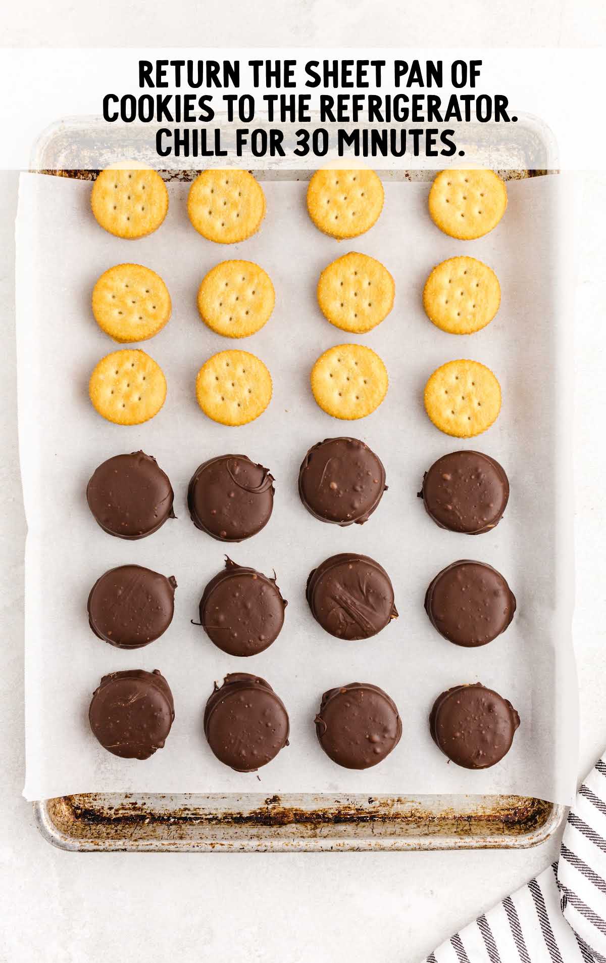 Chocolate Peanut Butter Ritz Cookies chilled on a sheet pan