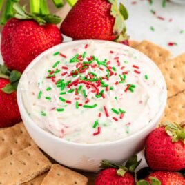 a close up shot of Christmas Sugar Cookie Dip in a bowl