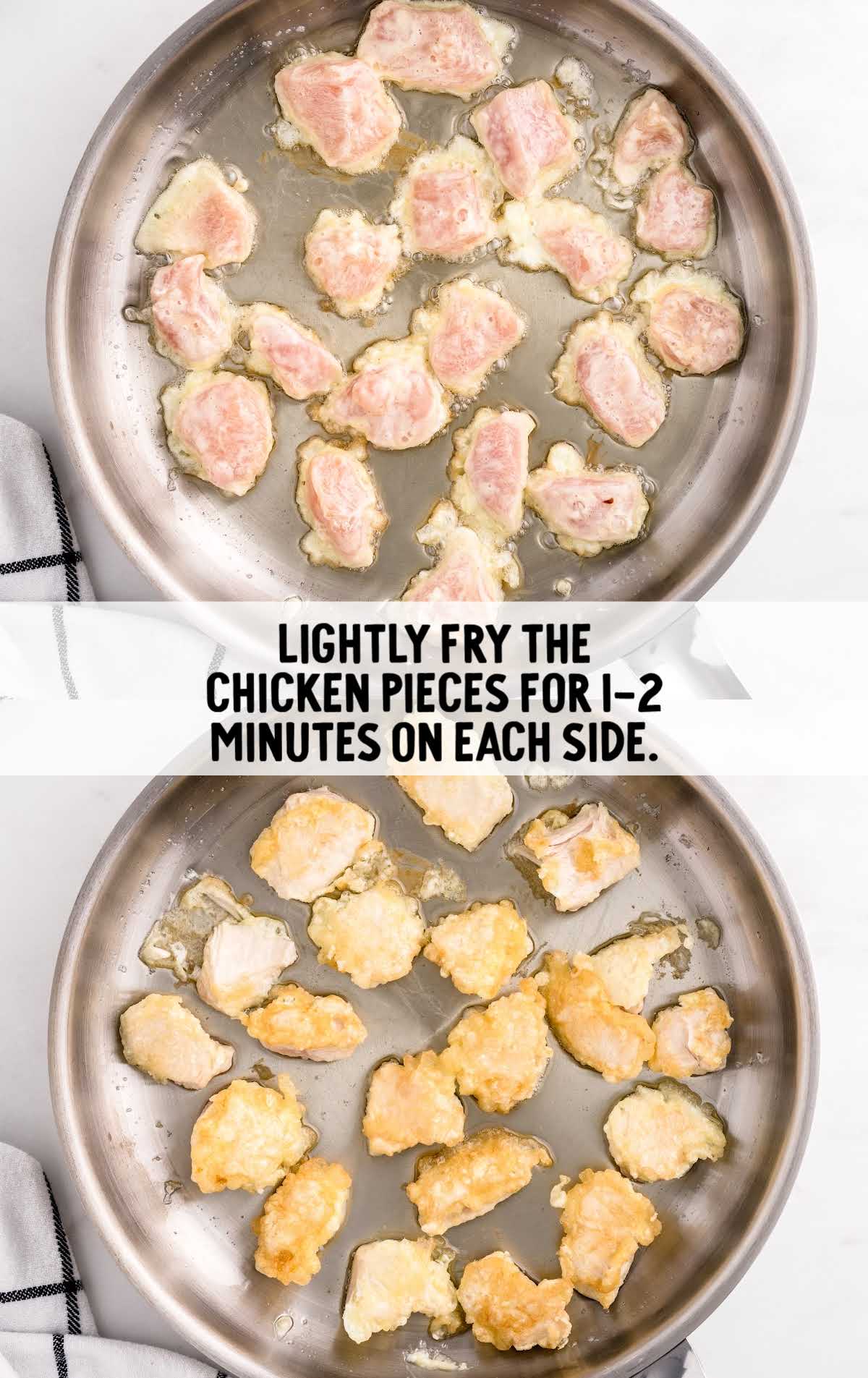 pieces of chicken frying in a skillet