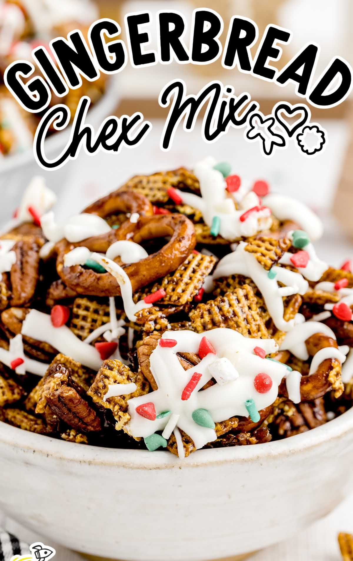 a close up shot of Gingerbread Chex Mix in a bowl