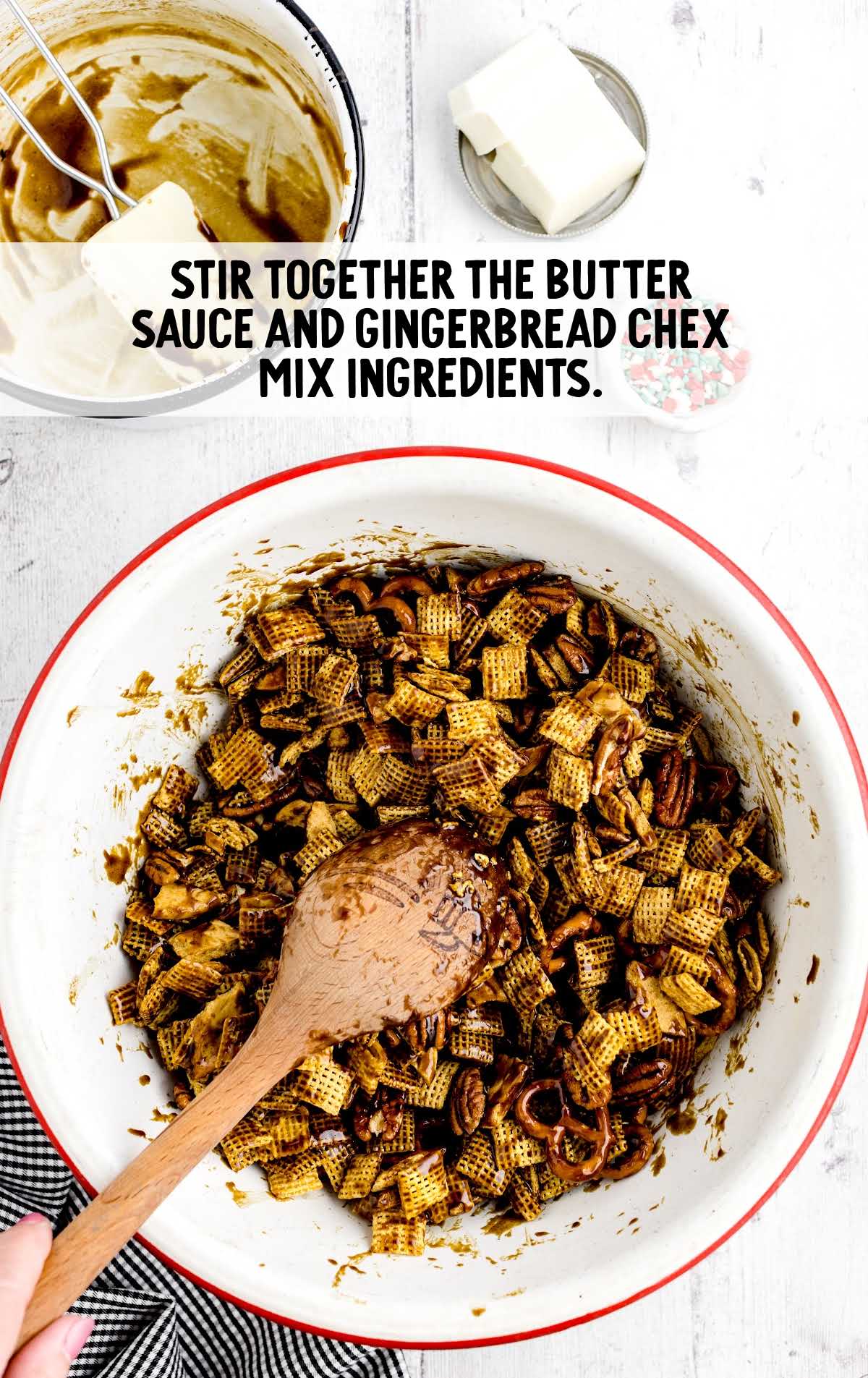 butter sauce and chex mix ingredients stirred in a bowl