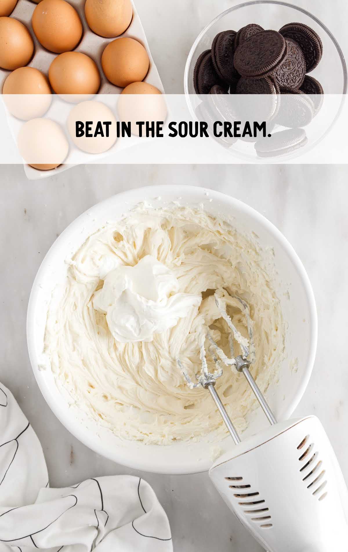 sour cream beat into the cream cheese mixture in the bowl