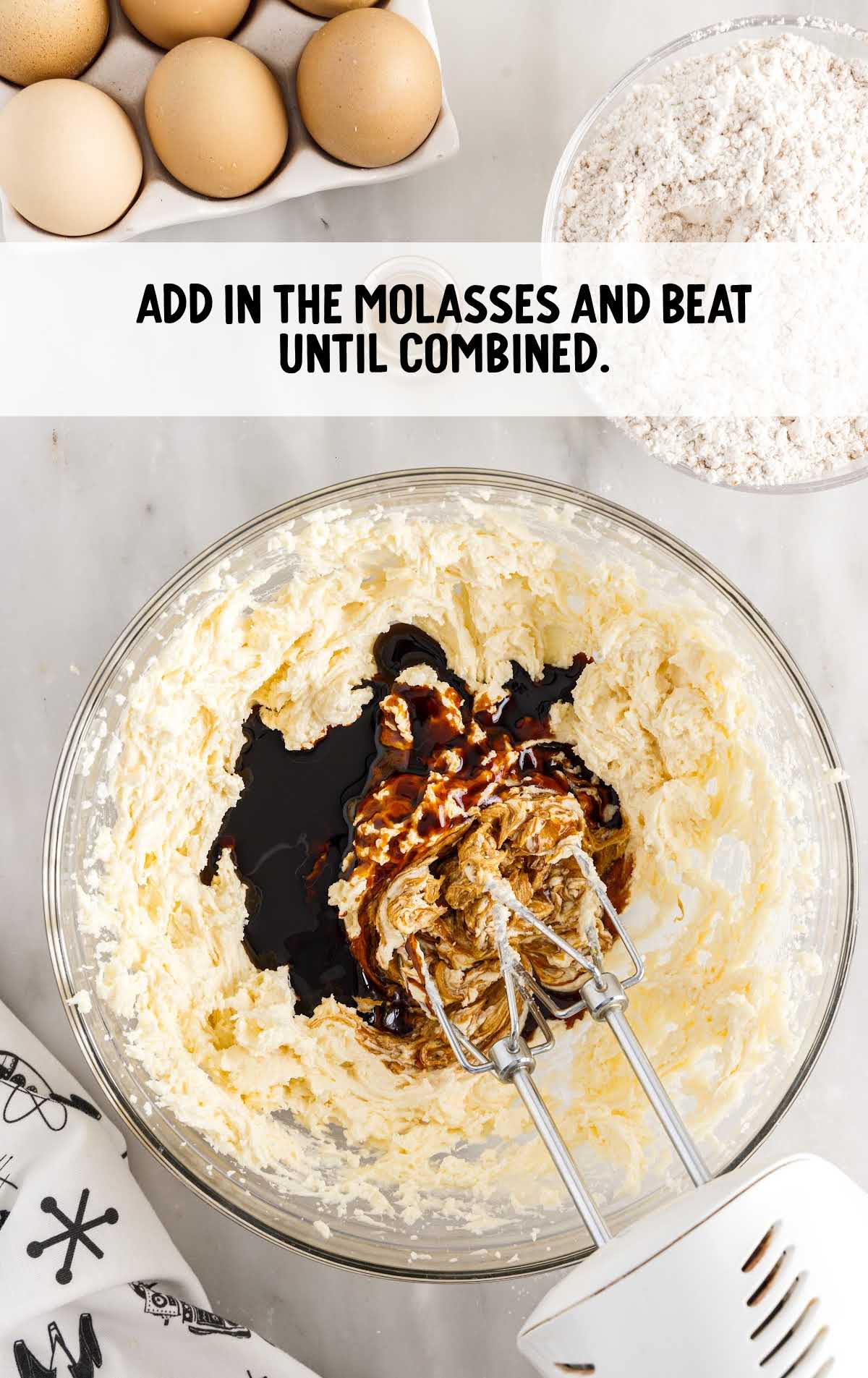 molasses added to the butter mixture in a bowl and blended together