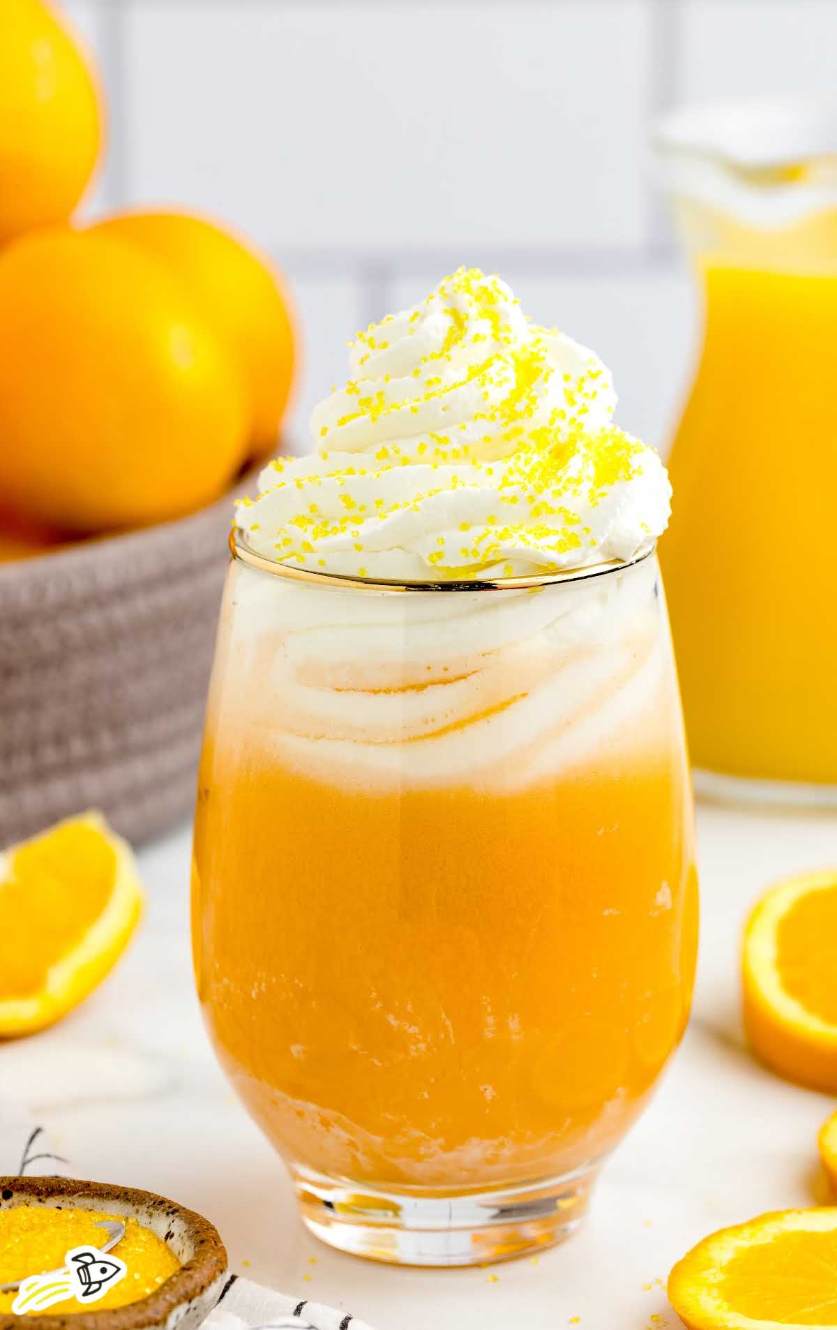 a close up shot of Orange Creamsicle Cocktail in a glass