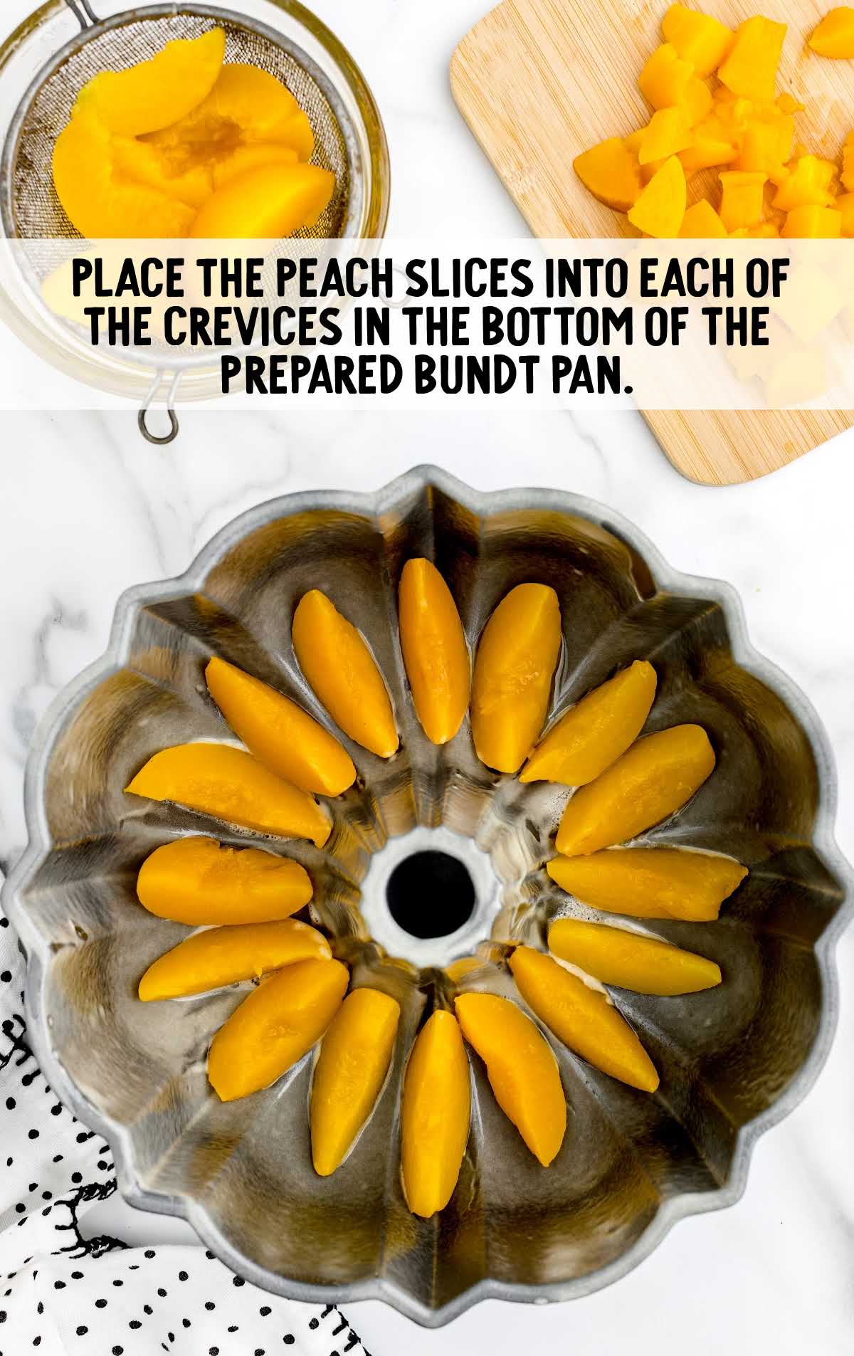 slices of peaches placed in the bottom of the bundt pan