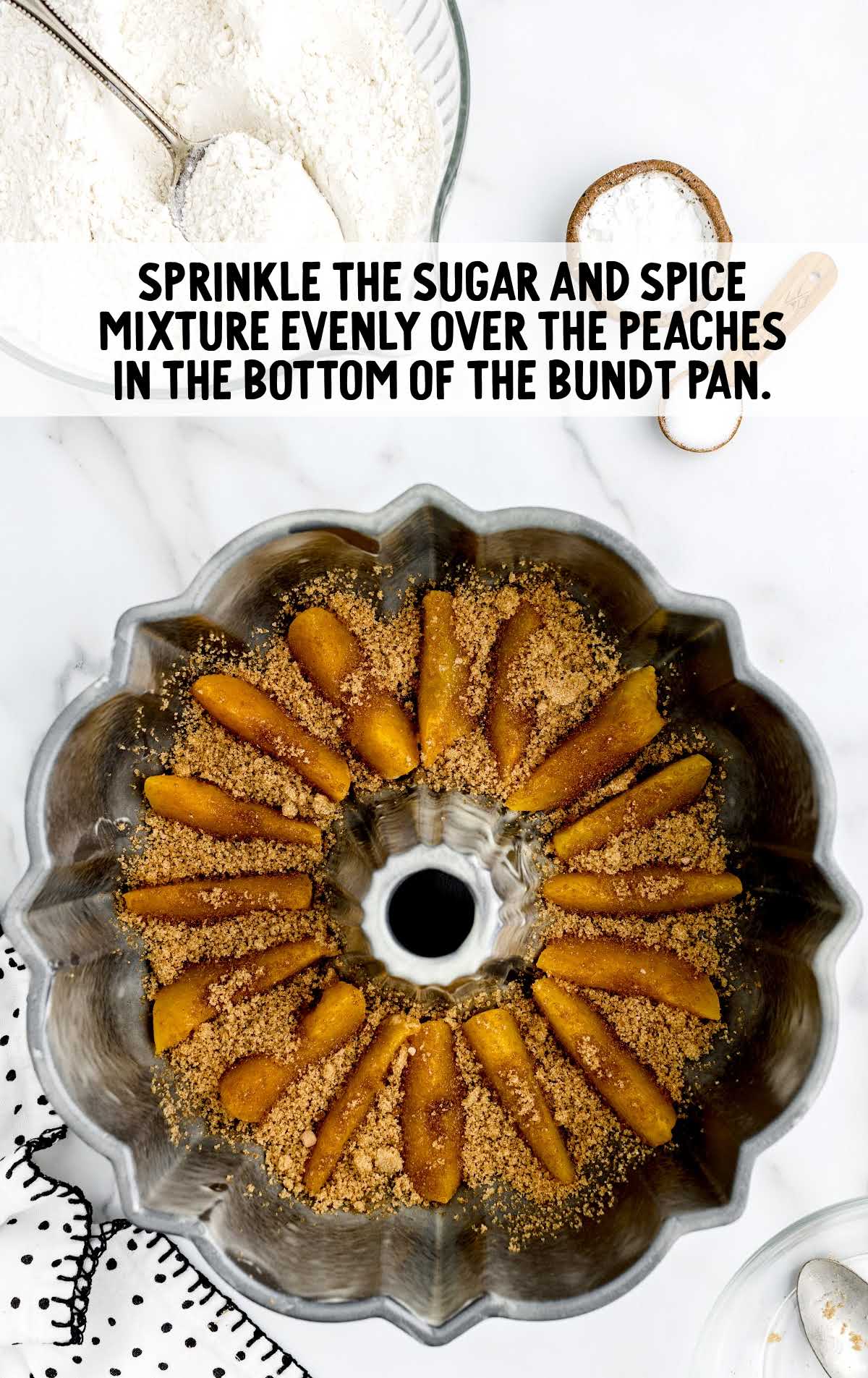sugar and spice mixture sprinkled in the bottom of the bundt pan