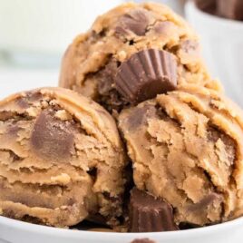 close up shot of scoops of Peanut Butter Cookie Dough in a bowl