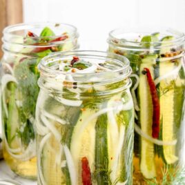 A close up shot of Refrigerator Pickles in jars