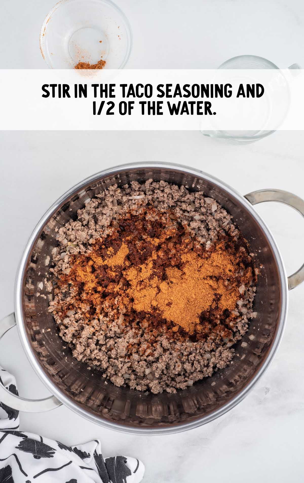 taco seasoning and water stirred in a pot
