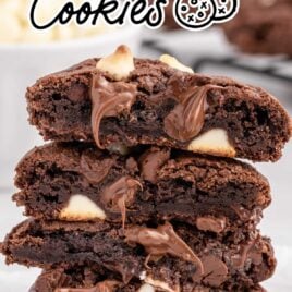 a close up shot of Triple Chocolate Cookies split in half and stacked on top of each other