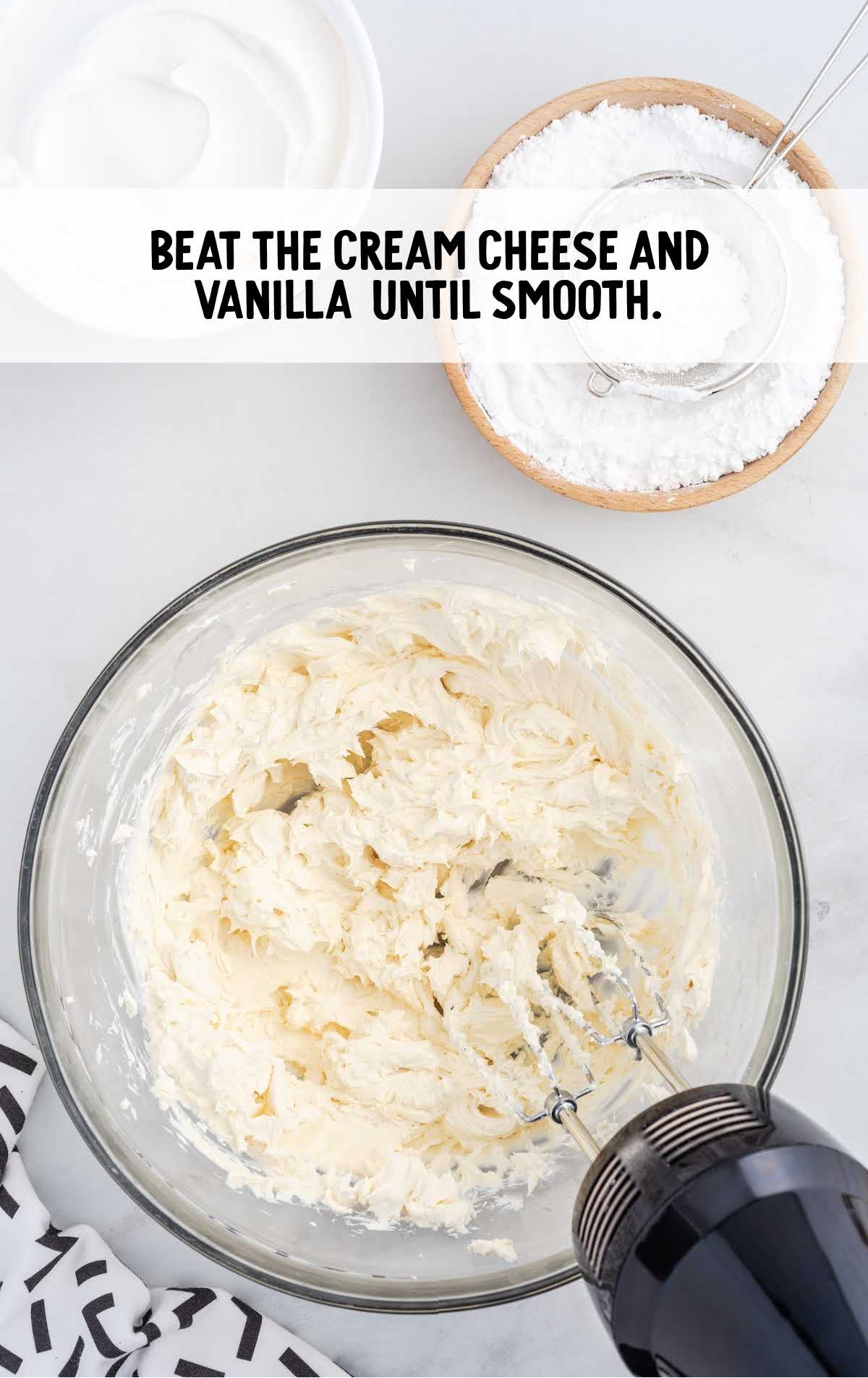 cream cheese and vanilla blended in a bowl