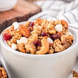 a close up shot of Christmas Granola in a bowl