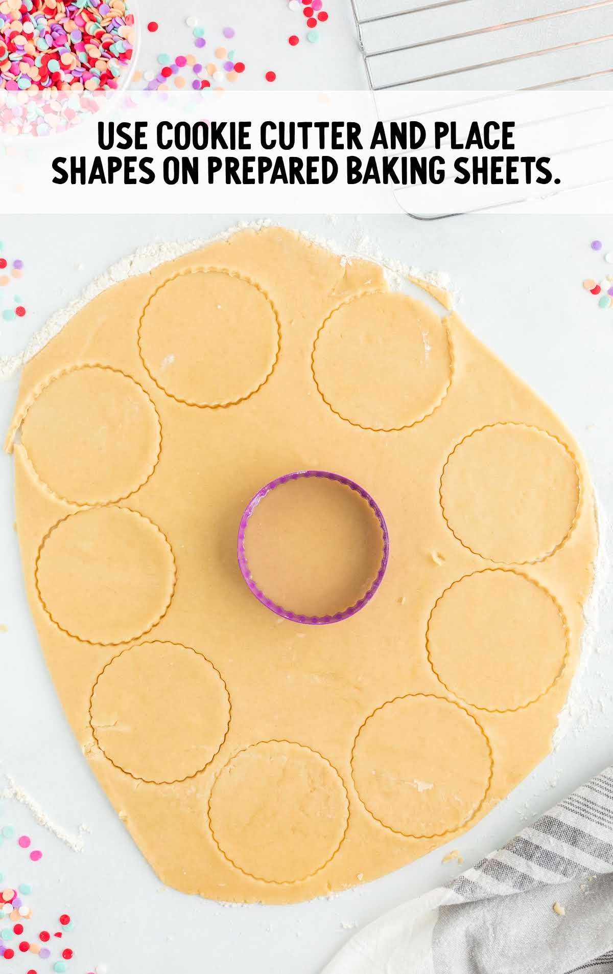using a cookie cutter cut mixture and place in a baking sheet