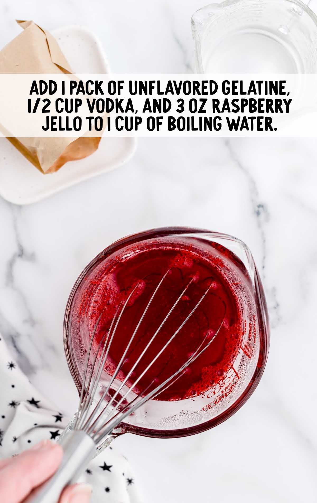 unflavored gelatin, vodka, raspberry jello and boiling water whisked in a measuring cup