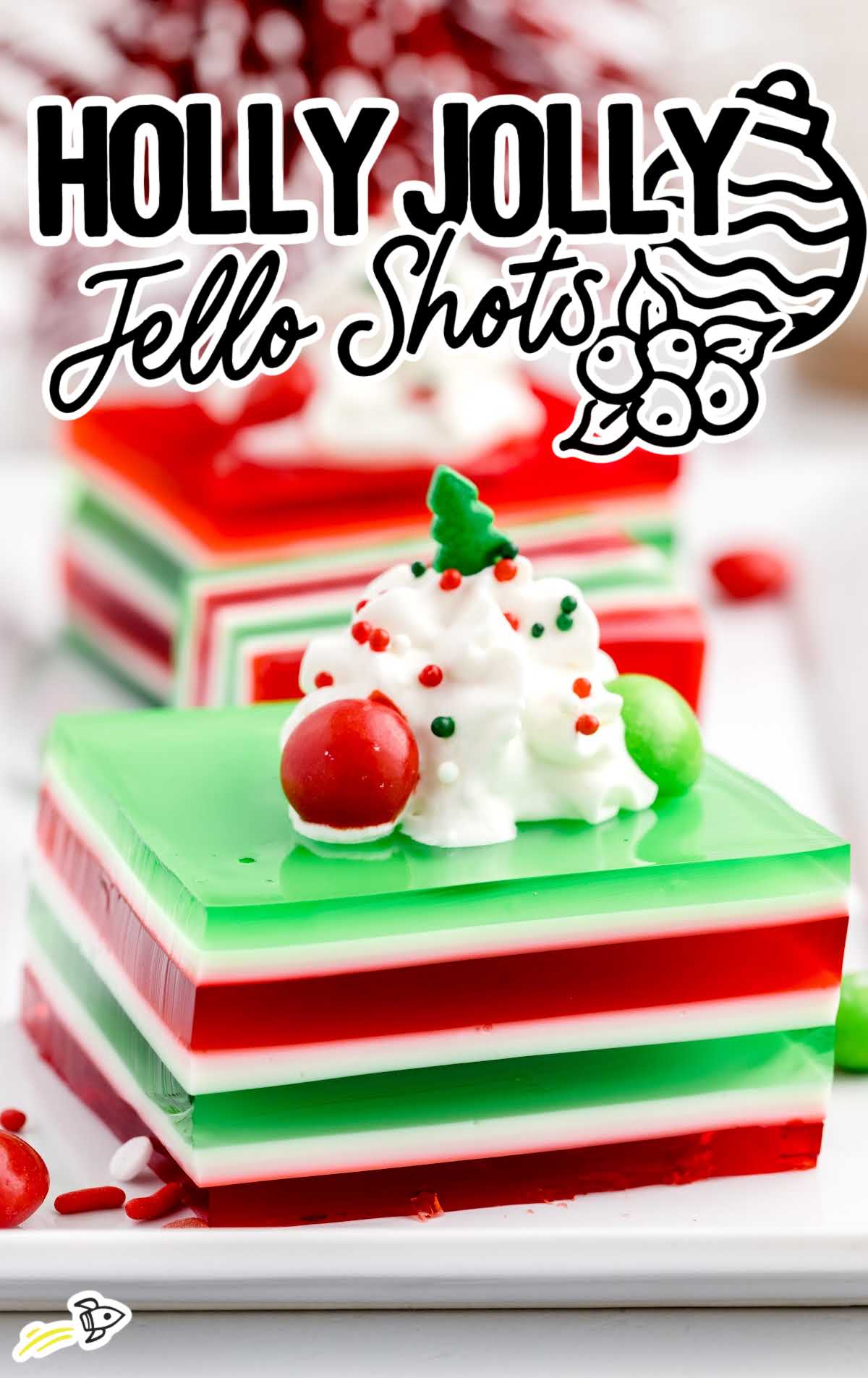 a close up shot of Holly Jolly Jello Shots on a plate