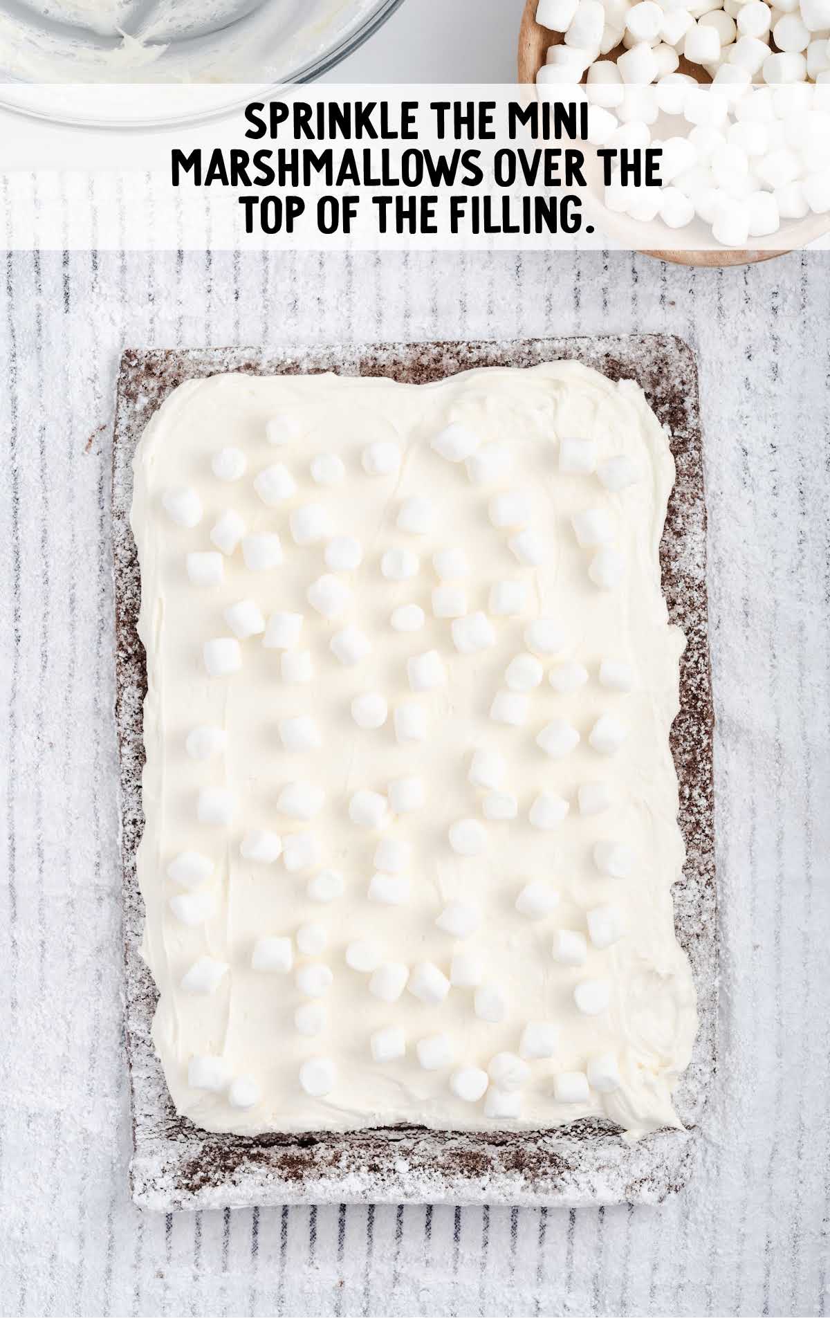 marshmallows sprinkled over the top of the filling