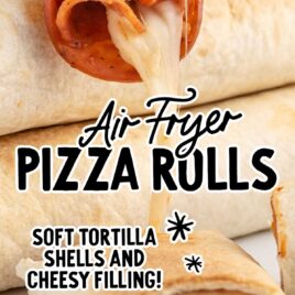 close up shot of Air Fryer Pizza Rolls on a plate and one split in half