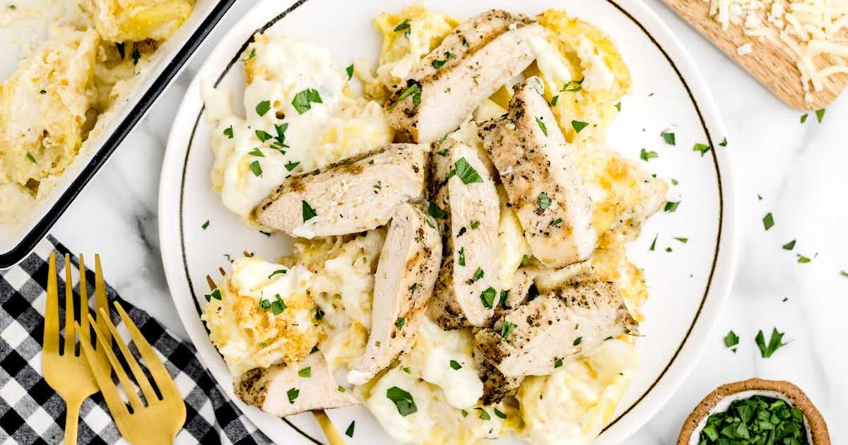 https://spaceshipsandlaserbeams.com/wp-content/uploads/2022/10/Asiago-Tortellini-Alfredo-with-Grilled-Chicken-Featuerd-image.jpg