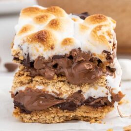 a close up shot of a piece of Baked S’mores