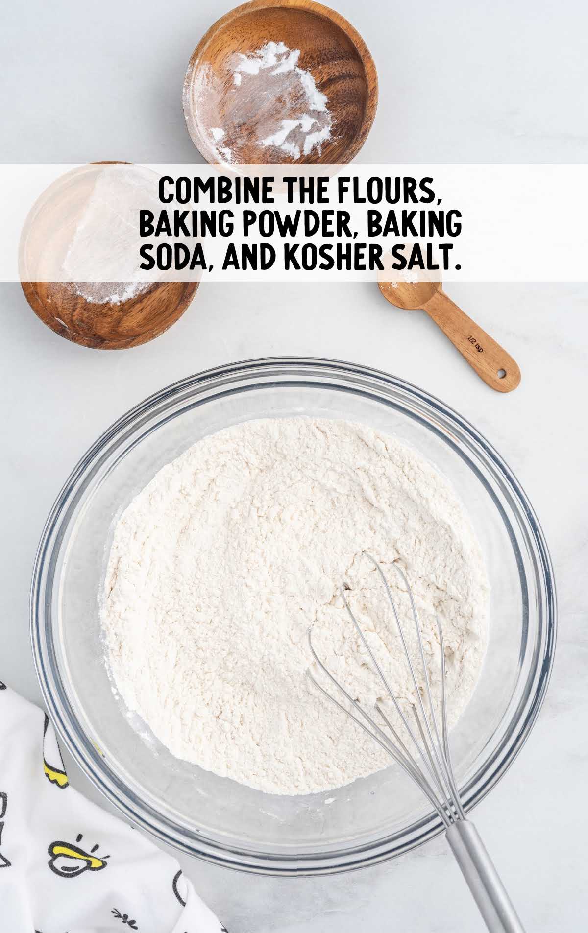 flour, baking powder, baking soda, and kosher salt whisked in a bowl